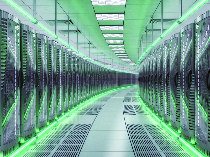 Data center servers with green LED lights glowing